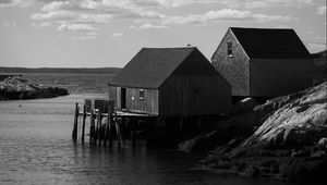 Preview wallpaper houses, river, pier, piles, bw