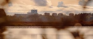 Preview wallpaper houses, river, shore, grass, blur