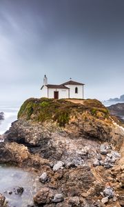 Preview wallpaper houses, rocks, cliff, ocean, water, nature