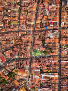 Preview wallpaper houses, roofs, aerial view, city