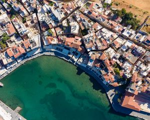 Preview wallpaper houses, roofs, city, bay, greece, aerial view