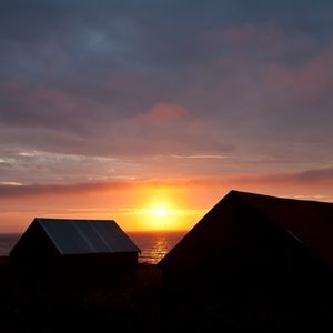Preview wallpaper houses, sea, sunset, dark