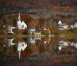 Preview wallpaper houses, tower, buildings, trees, reflection, lake