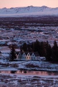 Preview wallpaper houses, trees, winter, field, mountains