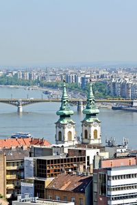 Preview wallpaper hungary, city, houses, sky, bridge