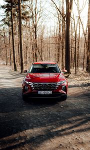Preview wallpaper hyundai, car, suv, red, road, forest