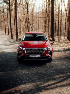 Preview wallpaper hyundai, car, suv, red, road, forest