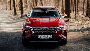 Preview wallpaper hyundai, car, suv, red, road, forest