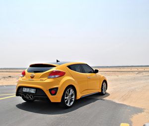 Preview wallpaper hyundai veloster, yellow, side view, desert