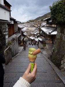 Preview wallpaper ice cream, dessert, hand, street, buildings, japan