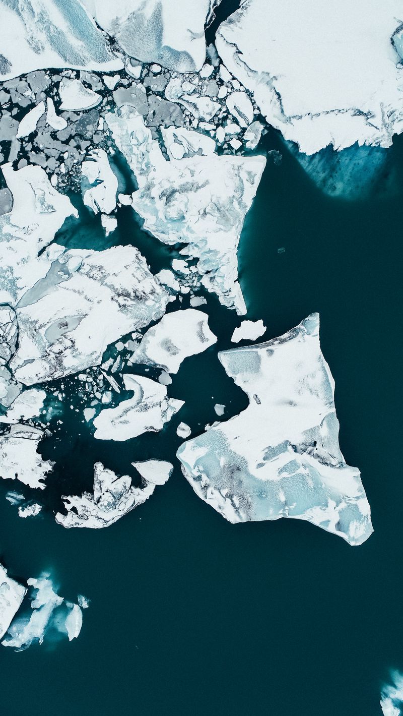 Download wallpaper 800x1420 ice floe, iceberg, glacier, aerial view ...
