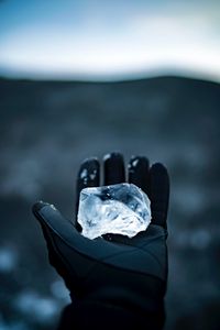 Preview wallpaper ice, hand, glove, winter, blur