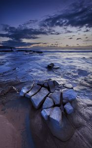 Preview wallpaper ice, ice floes, stones, horizon, sky