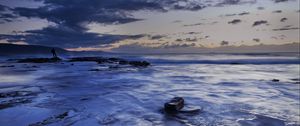 Preview wallpaper ice, ice floes, stones, horizon, sky