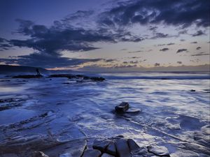 Preview wallpaper ice, ice floes, stones, horizon, sky