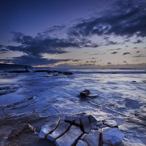 Preview wallpaper ice, ice floes, stones, horizon, sky