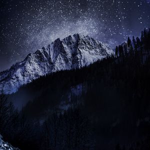 Preview wallpaper ice, mountain, snow, forest, night, winter