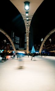 Preview wallpaper ice rink, people, blur, long exposure