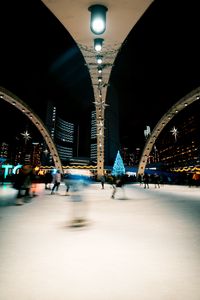 Preview wallpaper ice rink, people, blur, long exposure