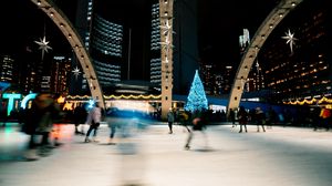 Preview wallpaper ice rink, people, blur, long exposure