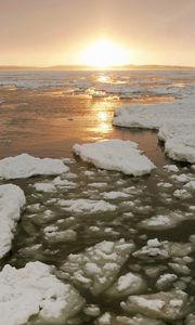 Preview wallpaper ice, river, canada, cold, winter, sun, evening, decline