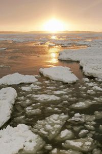 Preview wallpaper ice, river, canada, cold, winter, sun, evening, decline