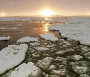 Preview wallpaper ice, river, canada, cold, winter, sun, evening, decline