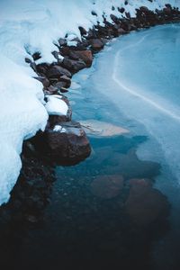 Preview wallpaper ice, snow, stones, shore, frozen