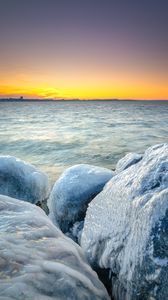 Preview wallpaper ice, stones, frozen, coast, winter