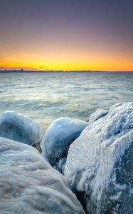 Preview wallpaper ice, stones, frozen, coast, winter