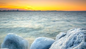 Preview wallpaper ice, stones, frozen, coast, winter