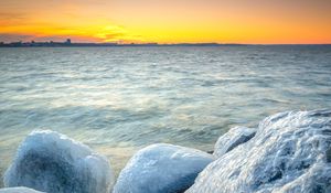 Preview wallpaper ice, stones, frozen, coast, winter