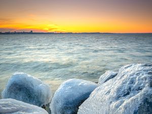 Preview wallpaper ice, stones, frozen, coast, winter