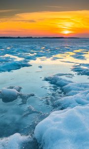 Preview wallpaper ice, water, sunset, winter, horizon, nature
