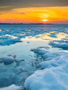 Preview wallpaper ice, water, sunset, winter, horizon, nature