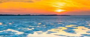 Preview wallpaper ice, water, sunset, winter, horizon, nature