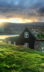 Preview wallpaper iceland, house, stones, decline, lake, mountains, eremite