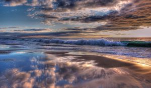 Preview wallpaper indian ocean, water, waves, beach, clouds, sunset