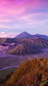 Preview wallpaper indonesia, island, java, volcano bromo, hills, altitude, blue, pink, sky, clouds