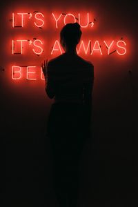 Preview wallpaper inscription, girl, backlight, wall