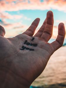 Preview wallpaper inscription, hand, palm, love