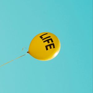 Preview wallpaper inscription, life, balloon, yellow sky, cloudless, minimalism