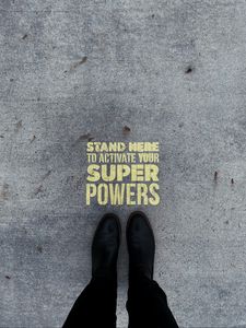 Preview wallpaper inscription, superpower, text, asphalt, feet