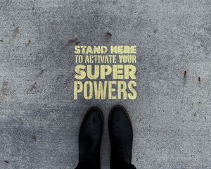 Preview wallpaper inscription, superpower, text, asphalt, feet