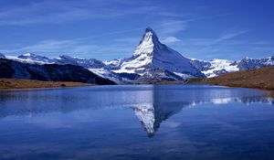 Preview wallpaper inter, mountain, top, peak, lake, reflection