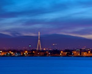 Preview wallpaper ireland, dublin, evening, dusk, sky, blue, clouds, mountains, houses, lights, quay, river