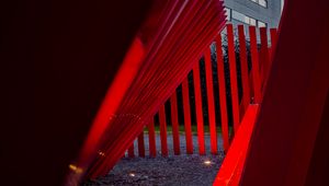 Preview wallpaper iron, red, pebbles, buildings