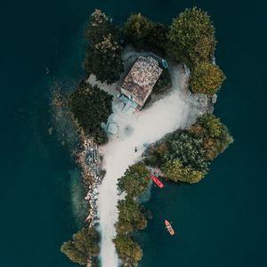 Preview wallpaper island, aerial view, sea, buildings, trees