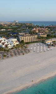 Preview wallpaper island, beach, buildings, sea