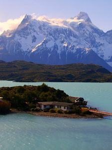 Preview wallpaper island, bridge, mountains, home, sky, trace